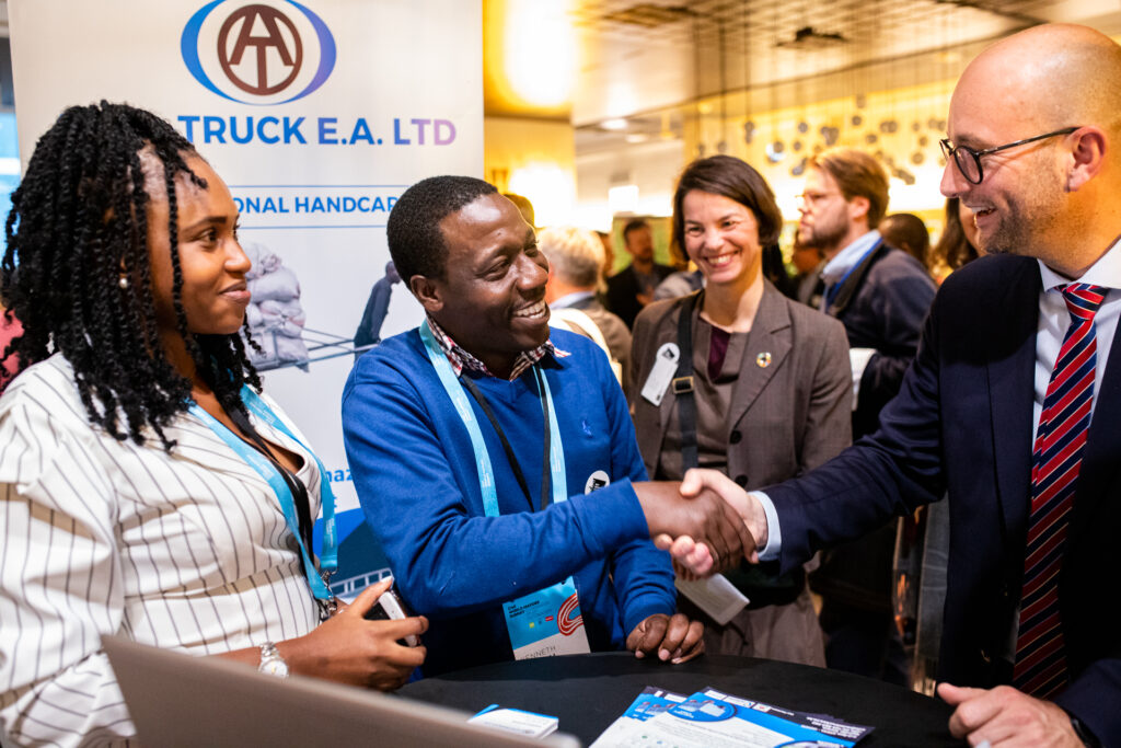 Participants shaking hands with a partner.